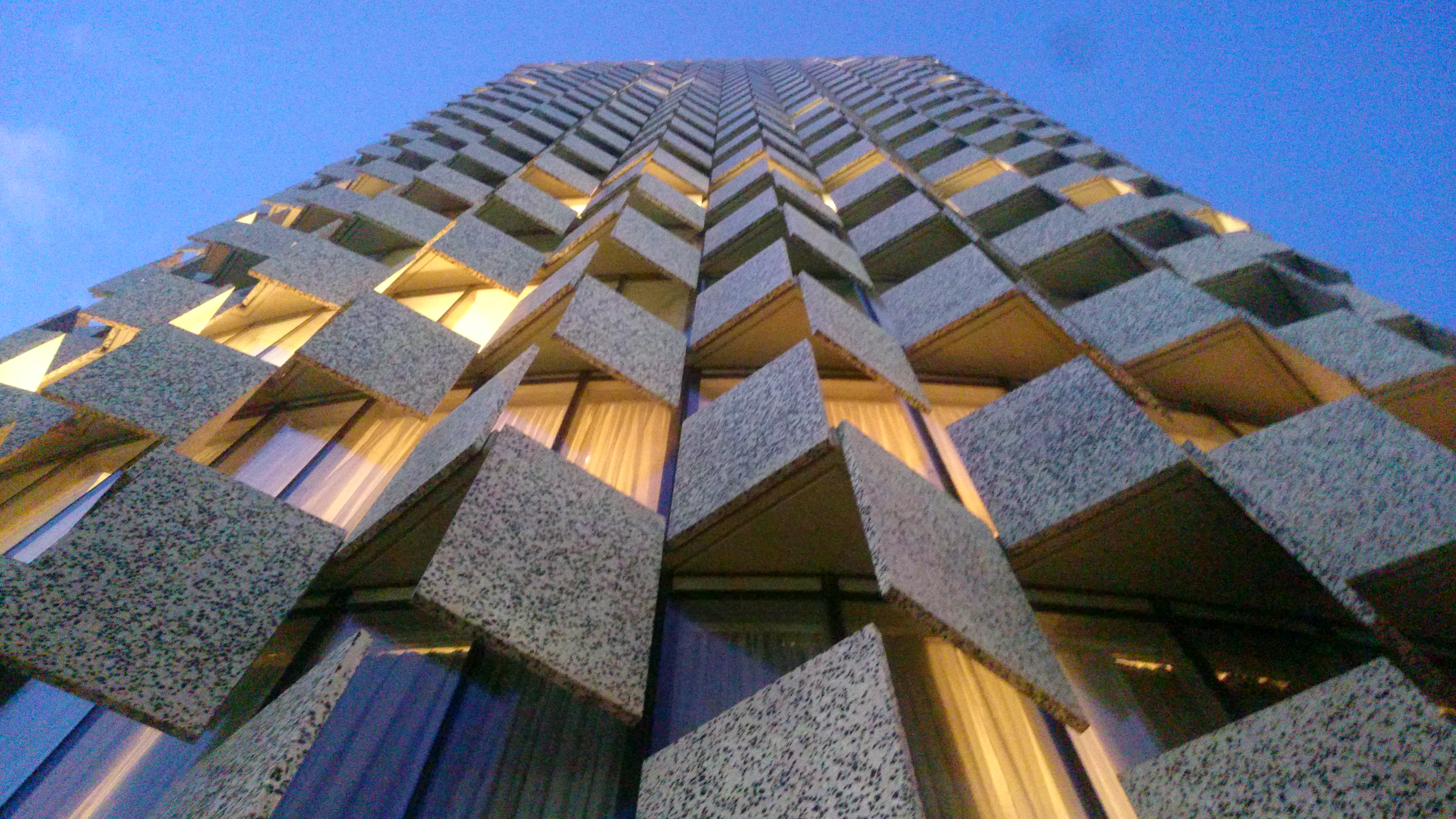 The tower's facade at dusk